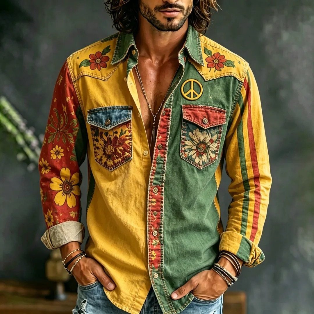 Man wearing a vibrant, multi-colored floral patterned shirt with a peace sign patch.